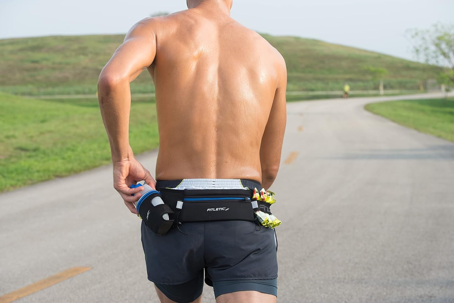 image:imageFitletic Hydration Running Belt With 12oz Quick Flow Water Bottle For Men amp Women Race Belt Gel Holder amp Bib Toggles Patented Bounce Free Design Water Resistant Fits All Phones Fully LoadedBlack