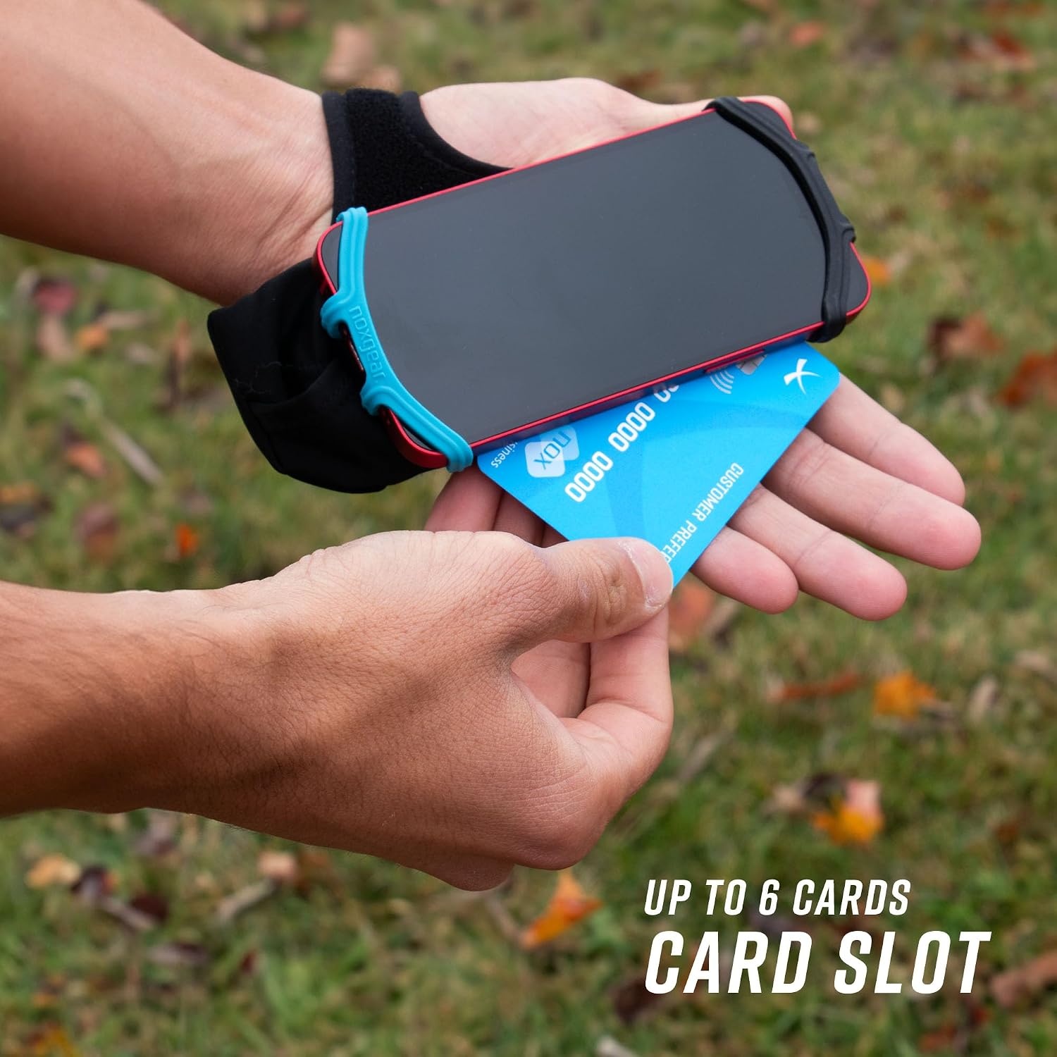 image:imageNoxgear Hand Held Phone Holder Handheld Grip Phone Holder with Key Fob amp Card Slot for Running Jogging amp Working Out Compatible with All Phones iPhone Samsung amp Google Machine WashableNoxgear Blue